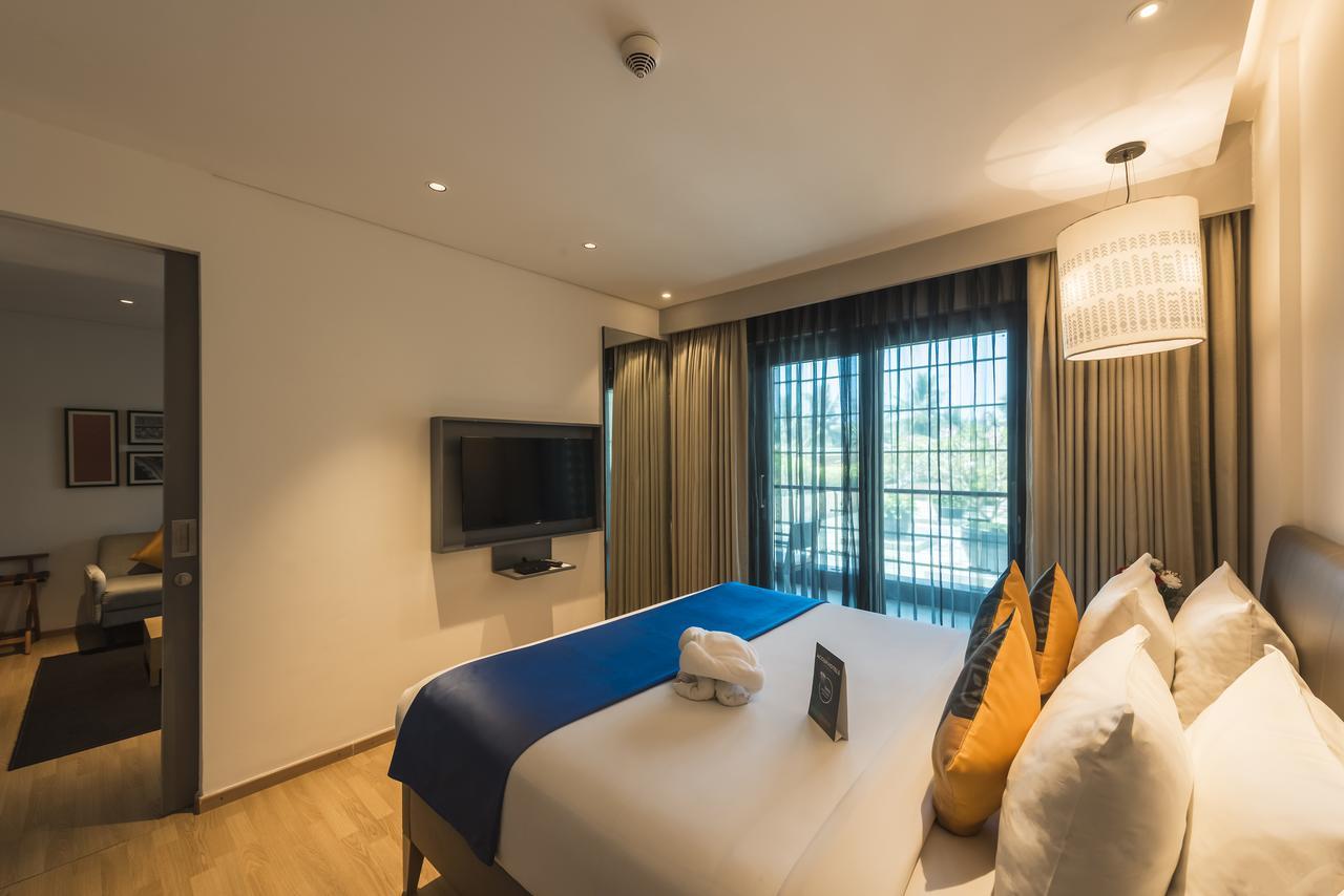 Grand Mercure Mysore - An Accor Brand Exteriör bild A bedroom at the Park